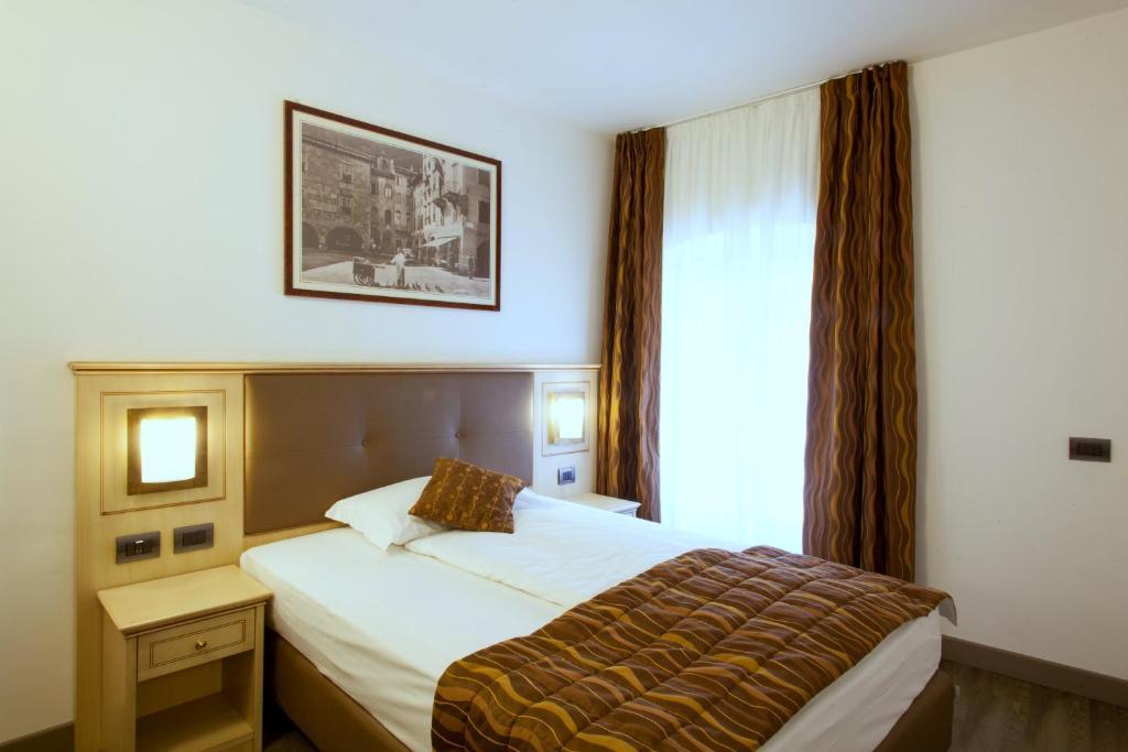 Hotel Portici - Romantik & Wellness Riva del Garda Pokoj fotografie